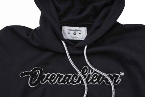 A close up of the hood on a black hoodie