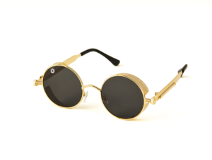 A pair of sunglasses with black lenses and gold frames.