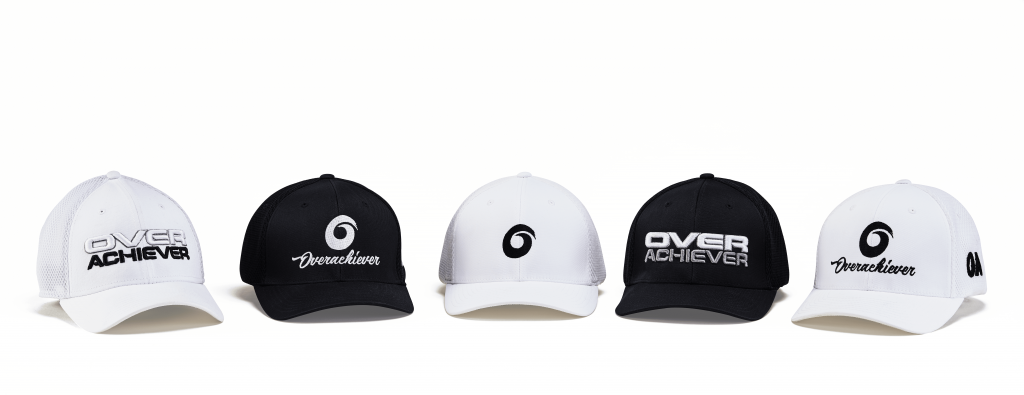 Three different hats with the logo of a sports team.